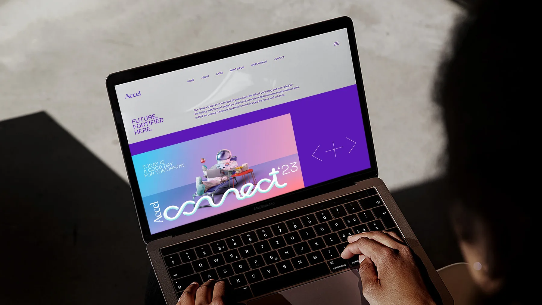 A laptop screen showing the Accel Connect event microsite carrying the same key visual and wordmark