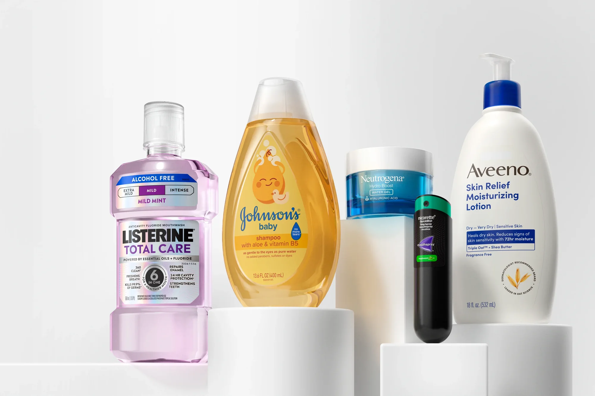 Five Kenvue brands staged together (Listerine, Johnson’s Baby, Neutrogena, Nicorette and Aveeno), spanning oral care, baby, skin and cessation